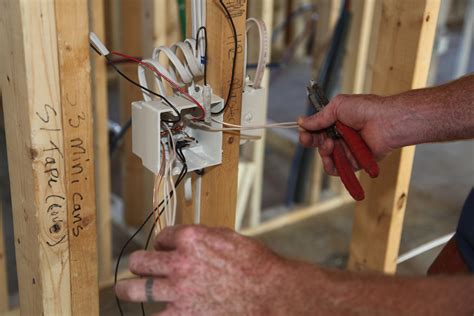 electrical box rough in|roughing in electrical outlets.